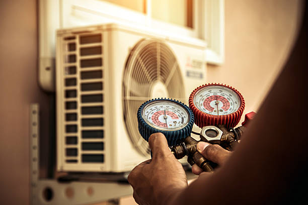 Professional Heat Pump Repair technician working in Hamilton, VA